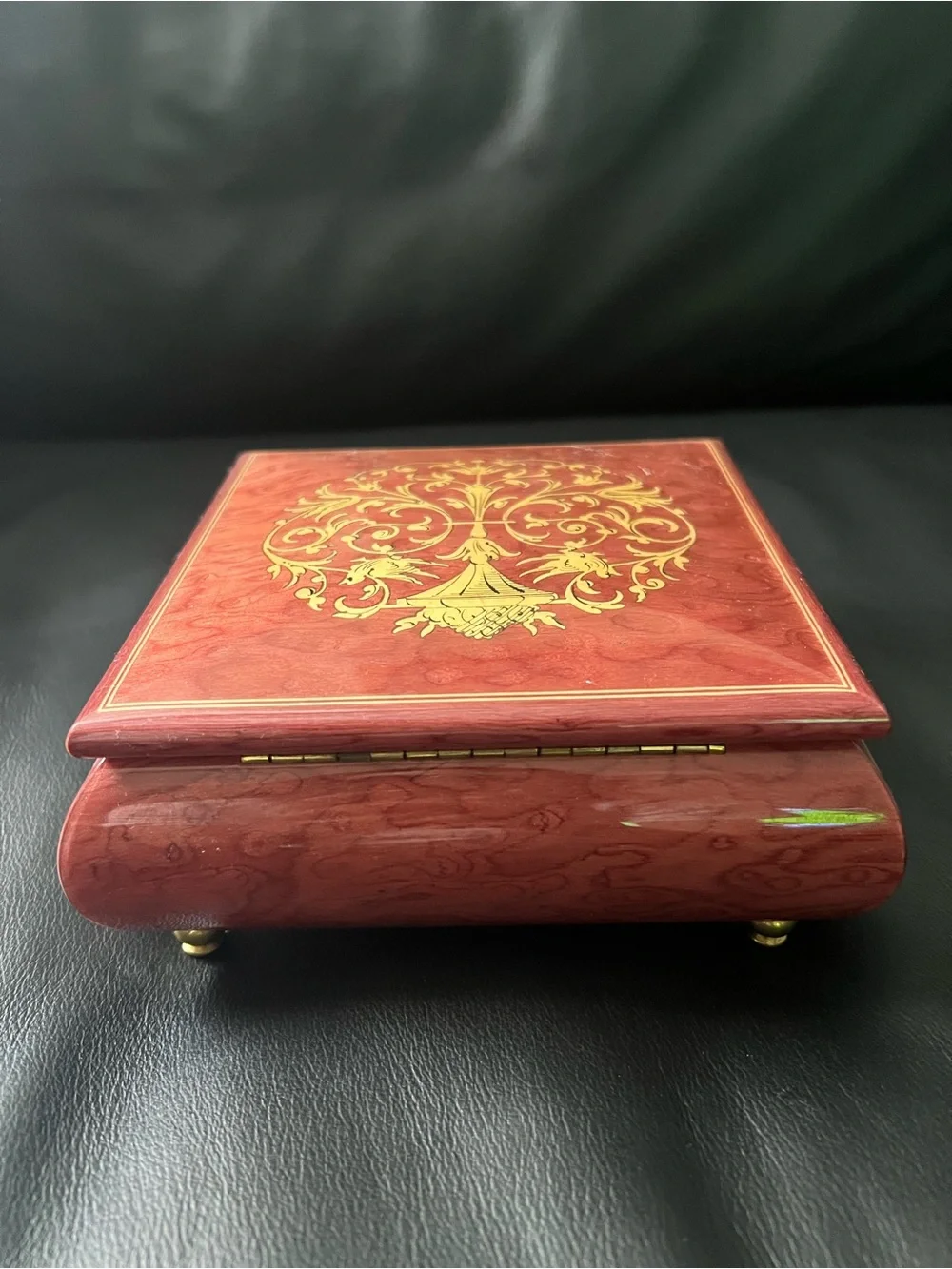 Ornate Red Wood Music Box with Gold Inlay